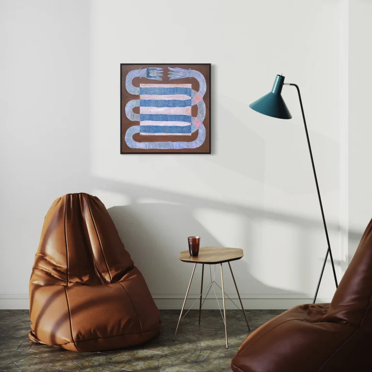 Interior detail of the abstract artwork Winter Lilies by Jenny Atina, displayed on a white wall in a cozy living room with brown beanbags, a small wooden side table, and a modern teal floor lamp.